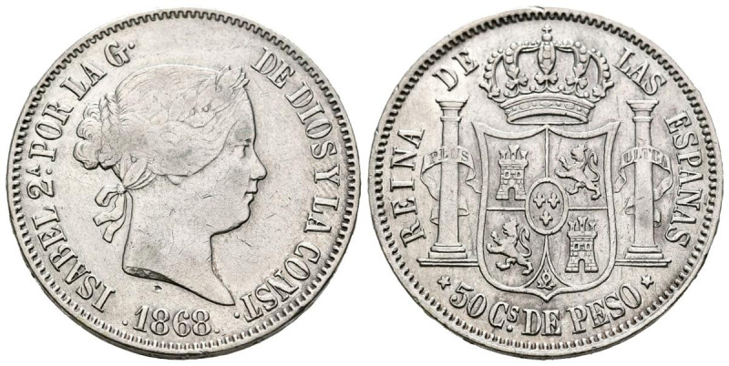 ISABEL II (1833-1868). 50 Centavos de Peso (Ar. 12,91g/30mm). 1868. Manila. (Cal...