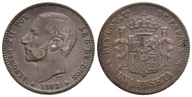 ALFONSO XII (1874-1885). 1 Peseta (Ar. 4,96g/23mm). 1883 *18-83. Madrid MSM. (Cal-2019-21). MBC. Pátina oscura.