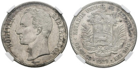 ESTADOS UNIDOS DE VENEZUELA. 5 Bolívares. (Ar. 25,00g/37mm). 1929. Philadelphia(Km#Y24.2). Variante 9 bajo. Encapsulado NGC AU Details. Rayas en anver...