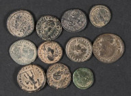 IMPERIO ROMANO. Lote compuesto por 11 pequeños bronces de distintos emperadores del Bajo Imperio Romano, de los cuales destacan Honorio o Aelia Eudoxi...
