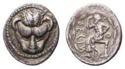 Rhegion - Drachm circa 450-445 BC - Obverse: Head of lion facing - Reverse: Iokastos (or Aristaios?) seated left, wearing chlamys draped from his wais...