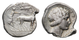 Katane - Tetradrachm 435-412 BC - Obverse: Charioteer, holding kentron and reins, driving slow quadriga of horses right; above, Nike flying left, crow...