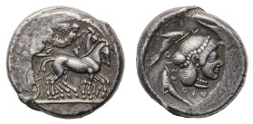 Syracuse - Deinomenid Tyranny (485-466 BC) - Tetradrachm circa 480-475 BC - Obverse: Charioteer driving quadriga right; above, Nike fying right, crown...