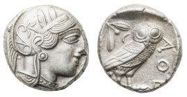 Athens - Tetradrachm circa 454-404 BC - Obverse: Helmeted head of Athena right, with frontal eye - Reverse: Owl standing right, head facing, closed ta...