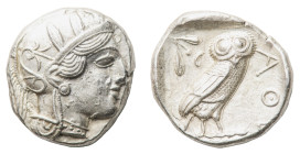 Athens - Tetradrachm circa 454-404 BC - Obverse: Helmeted head of Athena right, with frontal eye - Reverse: Owl standing right, head facing, closed ta...