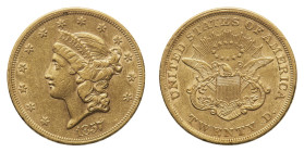 Gold 20 Dollars 1857 - Mint: Philadelphia - Obverse: Liberty head left - Reverse: Eagle with shield on breast - gr. 33,42 - About extremely fine Fried...