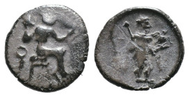 (Bronze, 0.53g 9mm)

CILICIA, Uncertain. 4th Century BC.

Obol