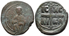 (Bronze, 8.83g 30mm)

BYZANTINE EMPIRE. Time of Michael IV. Circa 1034-1041