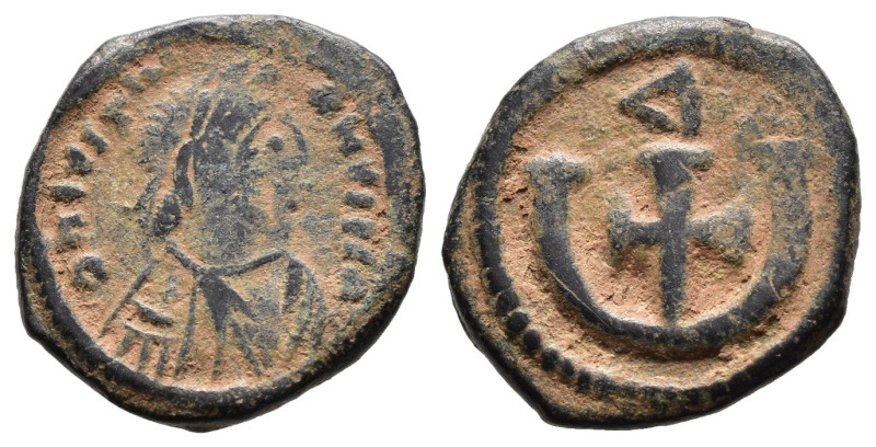 (Bronze, 2.14g 15mm)

BYZANTINE EMPIRE...Justin I. 518-527. Æ pentanummium….Th...