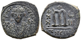 (Bronze, 10.24g 26mm)

BYZANTINE EMPIRE

Focas. Follis; Focas; 602-610 AD.