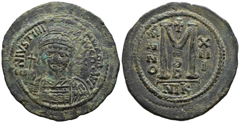 (Bronze, 24.21g 44mm)

BYZANTINE EMPIRE.

Justinian I. 527-565. Æ ...double ...