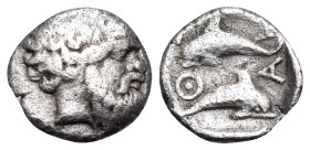 ISLANDS OFF THRACE, Thasos. Circa 412-404 BC. Hemiobol (Silver, 8 mm, 0.42 g, 12 h). Head of bald and bearded Silenos to right. Rev. Θ-Α-Σ-Ι Two dolph...
