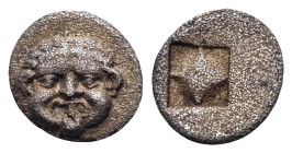MACEDON. Neapolis. Circa 424-350 BC. Tetartemorion (Silver, 7 mm, 0.25 g). Gorgoneion facing with extended tongue. Rev. Quadripartite incuse square. H...