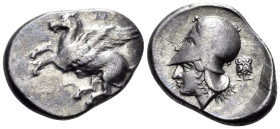 EPEIROS. Ambrakia. Circa 426-404 BC. Stater (Silver, 24 mm, 8.56 g, 6 h). A Pegasos flying left with straight wings. Rev. Head of Athena to left, wear...