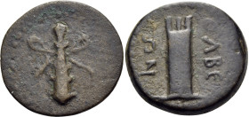 CILICIA. Olba. Pseudo-autonomous issue, time of Vespasian, 69-79. (Bronze, 18 mm, 3.86 g, 7 h). Club tied with fillet. Rev. ΟΛΒΕ/ΩΝ Tall crenellated t...