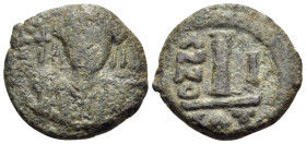 Maurice Tiberius, 582-602. Decanummium (Bronze, 16 mm, 2.92 g, 6 h), Catania, year 1 = 582-583. D N TIb MAVRC P P AVG Crowned and cuirassed bust of Ma...