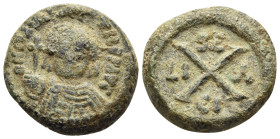 Maurice Tiberius, 582-602. Decanummium (Bronze, 15 mm, 3.68 g, 6 h), Syracuse, 588-602. D N MAVR TIb P P AVG Helmeted, draped, and cuirassed bust of M...