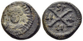 Maurice Tiberius, 582-602. Decanummium (Bronze, 14 mm, 3.63 g, 6 h), Syracuse, 588-602. D N MAVR TIb P P AVG Helmeted, draped, and cuirassed bust of M...