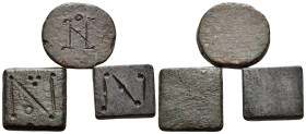 BYZANTINE WEIGHTS, Eastern Mediterranean/Aegean Area. Circa 6th-7th century. (Bronze, 12.02 g). Lot of Three (3) inscribed weights, two square and one...
