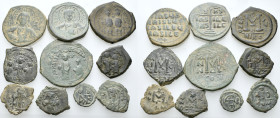 BYZANTINE. Circa 5th -10th century. (Bronze, 31.00 g). A lot of Ten (10) byzantine folles and fractions. All nicely patinated. Good fine to very fine....