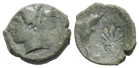 Sicily, Syracuse, c. 415-405 BC. Æ Hemilitron (17mm, 2.98g, 2h). Head of Arethusa l., hair bound in ampyx and sphendone; two leaves to r. R/ Dolphin s...
