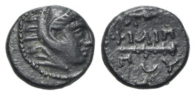 Kings of Macedon, Philip II, 359-336 BC. Æ 1/4 Unit (11mm, 1.38g, 8h). Head of Herakles r., wearing lion skin. R/ Club; Λ and sparehead above; crescen...