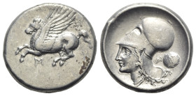 Akarnania, Metropolis, c. 300-250 BC. AR Stater (22mm, 8.37g, 12h). Pegasos flying l.; monogram below. R/ Helmeted head of Athena l.; monogram and Mac...
