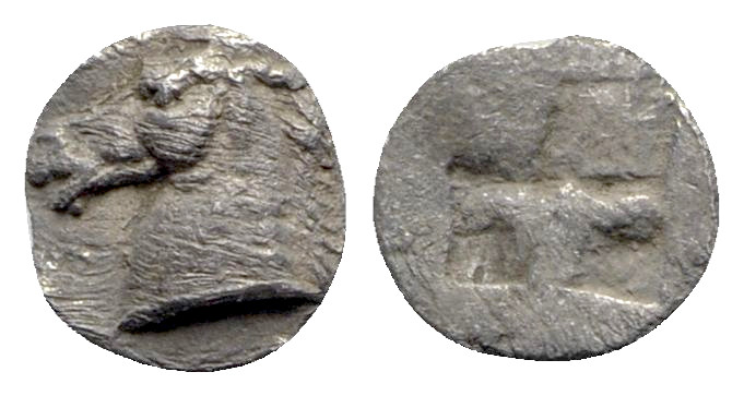 Aeolis, Kyme, c. 480-450 BC. AR Tetartemorion (5mm, 0.19g). Horse head l. R/ Qua...