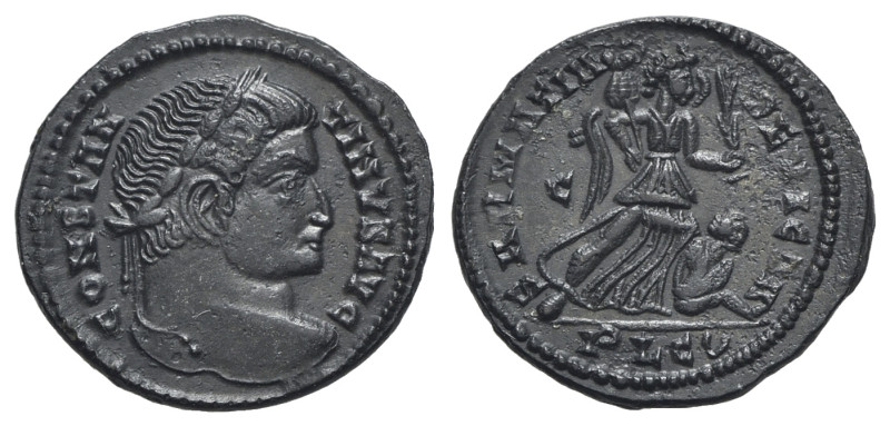 Constantine I (307/310-337). Æ Follis (20mm, 2.86g, 6h). Lugdunum, 323-4. Laurea...