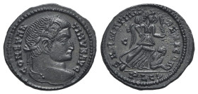 Constantine I (307/310-337). Æ Follis (20mm, 2.86g, 6h). Lugdunum, 323-4. Laureate head r. R/ Victory advancing r., holding palm and trophy, with l. f...