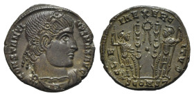 Constantine I (307/310-337). Æ Follis (17mm, 2.77g, 11h). Arelate, 333-4. Rosette diademed, draped and cuirassed bust r. R/ Soldiers standing, vis-à-v...