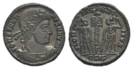 Constantine I (307/310-337). Æ Follis (16mm, 1.78g, 12h). Siscia. Rosette-diademed, draped and cuirassed bust r. R/ Two soldiers, each holding spear a...