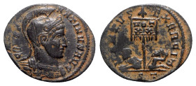 Constantine I (307/310-337). Æ Follis (20mm, 2.36g, 6h). Ticinum, 319-320. Helmeted and cuirassed bust r. R/ Two captives seated at base of standard i...