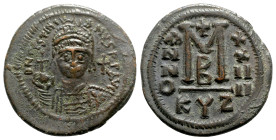 Justinian I (527-565). Æ 40 Nummi (35mm, 18.27g, 6h). Cyzicus, year 24 (550/1). Diademed, helmeted and cuirassed bust facing, holding globus cruciger;...
