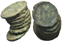 Clump of eight Byzantine Æ Folles (52x26mm, 123.15g). Large M visible on both sides.