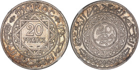 MAROC
Mohammed V (1927-1961). Essai de 20 francs, hybride 1er type - 2e type ND (1347 AH = 1928), Paris.NGC MS 66 (6631355-007).
Av. MAROC. Légende et...