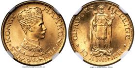 Haakon VII gold 10 Kroner 1910 MS65 NGC, Kongsberg mint, KM375, ABH-2. Fr-20. Mintage: 52,600. A delightful Gem with satiny surfaces enveloped in swir...