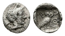 Attica, Athens. AR Hemiobol, 0.39 g 8.60 mm. Circa 454-404 BC.
Obv: Helmeted head of Athena right.
Rev: AΘΕ, Owl standing right, head facing; olive sp...