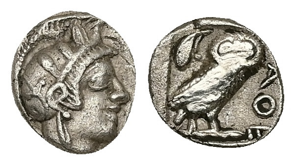 Attica, Athens. AR Obol, 0.60 g 9.55 mm. Circa 454-404 BC.
Obv: Helmeted head of...