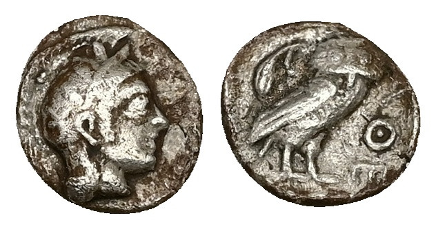 Attica, Athens. AR Obol, 0.62 g 9.75 mm. Circa 454-404 BC.
Obv: Helmeted head of...