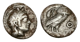 Attica, Athens. AR Obol, 0.62 g 9.75 mm. Circa 454-404 BC.
Obv: Helmeted head of Athena right.
Rev: AΘE, Owl standing right, head facing; olive sprig ...