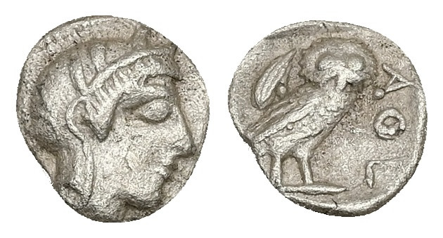 Attica, Athens. AR Obol, 0.63 g 9.67 mm. Circa 454-404 BC.
Obv: Helmeted head of...