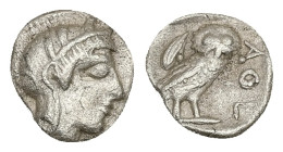 Attica, Athens. AR Obol, 0.63 g 9.67 mm. Circa 454-404 BC.
Obv: Helmeted head of Athena right.
Rev: AΘΕ, Owl standing right, head facing; olive sprig ...
