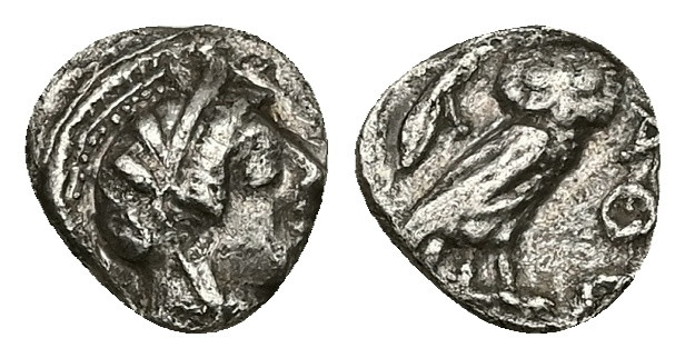 Attica, Athens. AR Obol, 0.67 g 9.26 mm. Circa 454-404 BC.
Obv: Helmeted head of...