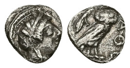 Attica, Athens. AR Obol, 0.67 g 9.26 mm. Circa 454-404 BC.
Obv: Helmeted head of Athena right.
Rev: AΘE,Owl standing right, head facing; olive sprig a...