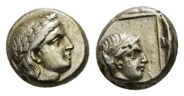 Lesbos, Mytilene. EL Hekte. 2.54 g 10.14 mm. Circa 377-326 BC. 
Obv: Laureate head of Apollo right; to left, [serpent coiled right].
Rev: Head of Arte...