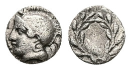 Aeolis, Elaia. AR Hemiobol, 0.42 g 7.79 mm. Circa 450-400 BC.
Obv: Helmeted head of Athena left.
Rev: Wreath.
Ref: SNG Copenhagen 164.
Fine/VF
