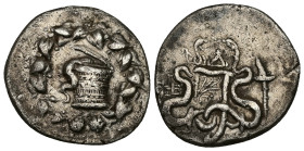 Ionia, Ephesos. AR Cistophoric Tetradrachm, 12.03 g 28.41 mm. Circa 180-67 BC. CY 4 = 131/0.
Obv: Cista mystica from which snake coils; around, ivy w...