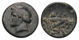 Ionia, Magnesia ad Meandrum. Ae, 2.03 g 14.12 mm. 4th century BC. Uncertain magistrate.
Obv: Laureate head of Apollo left 
Rev: MAΓ, forepart of bull ...