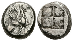 Ionia, Teos. AR Stater, 11.85 g 19.55 mm. Circa 500-450 BC.
Obv: Griffin with curled wings seated right, raising forepaw; grape bunch on vine to righ...